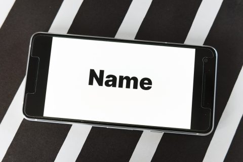 aqdlt.com aqdlt.ws 域名变更时间轴示意图，展示从早期.com域名到.ws备用域名的演变过程，背景为深色技术风格